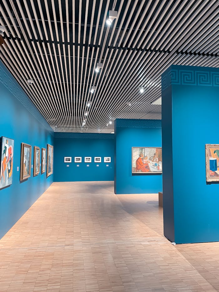 Explore this modern art gallery in Aarhus, Denmark with vibrant blue walls and unique installations.